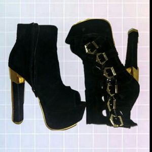 Ankle black booties high heel and gold buckles